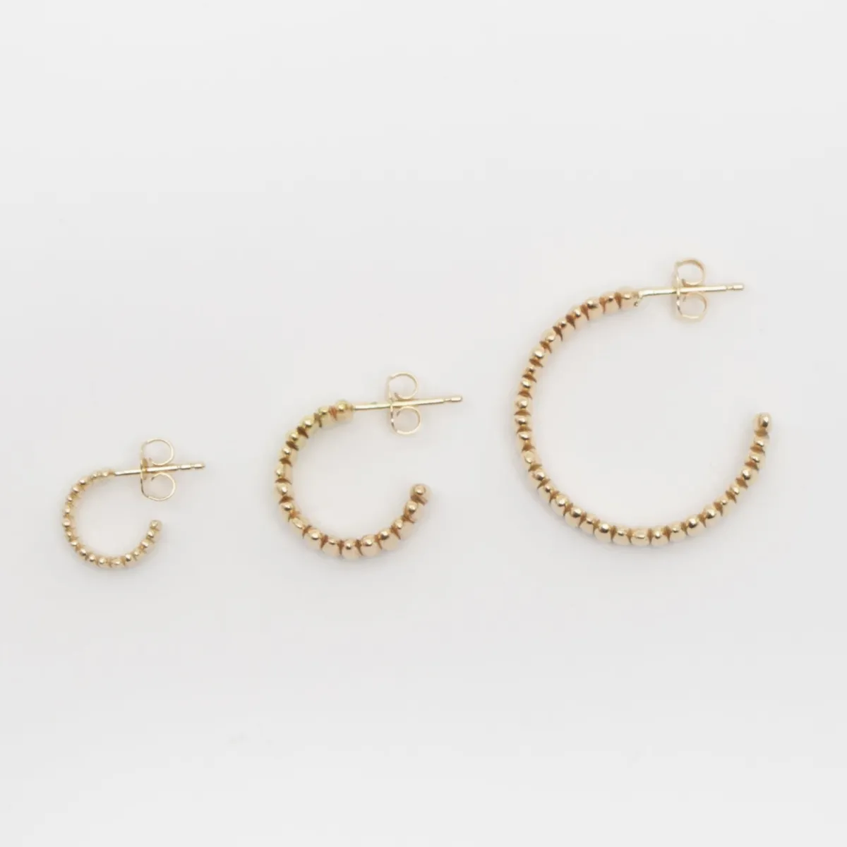 Hot Betsy & Iya Ryzi hoop earrings